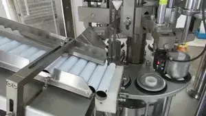 Machine de remplissage et scellage de tubes en aluminium
