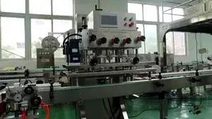 Machine de bouchage automatique à broche pour pots de miel