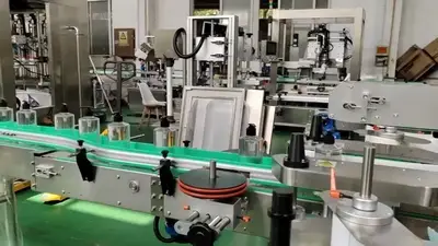 Étiqueteuse double face pour bouteilles rondes