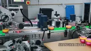 Étiqueteuse automatique par dessus