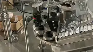 Machine de remplissage et scellage de tubes en aluminium 