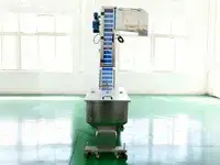 Élévateur automatique de bouchons