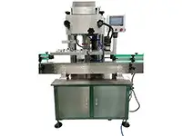 Capsuleuse automatique à quatre roues