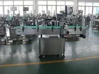 Étiqueteuse automatique à orientation