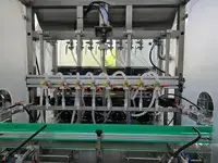 Remplisseuse à pompe péristaltique pour liquide