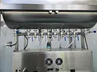 Remplisseuse à pompe péristaltique pour liquide