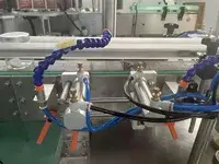 Capsuleuse automatique à une tête (mono-tête)