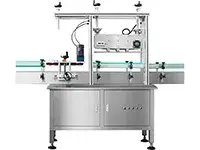 Capsuleuse automatique à pression