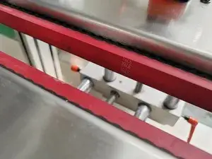 Système de maintien des bouteilles à double bande